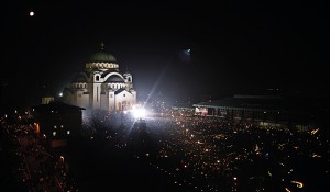 Thousands of Serbs burn candles and pray in front of Serbia's main Orthodox cathedral